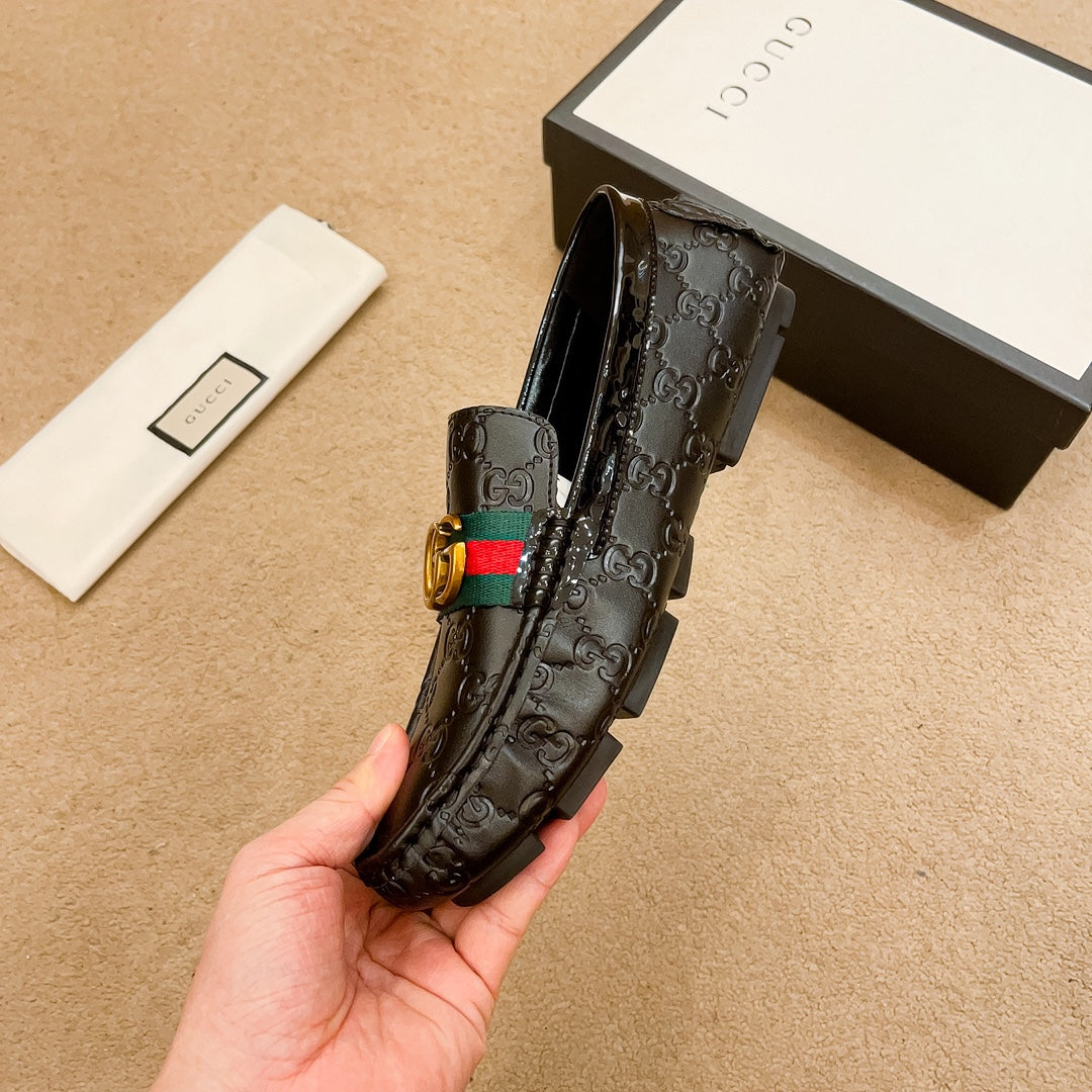 Letter-embossed leather loafers 1824040713