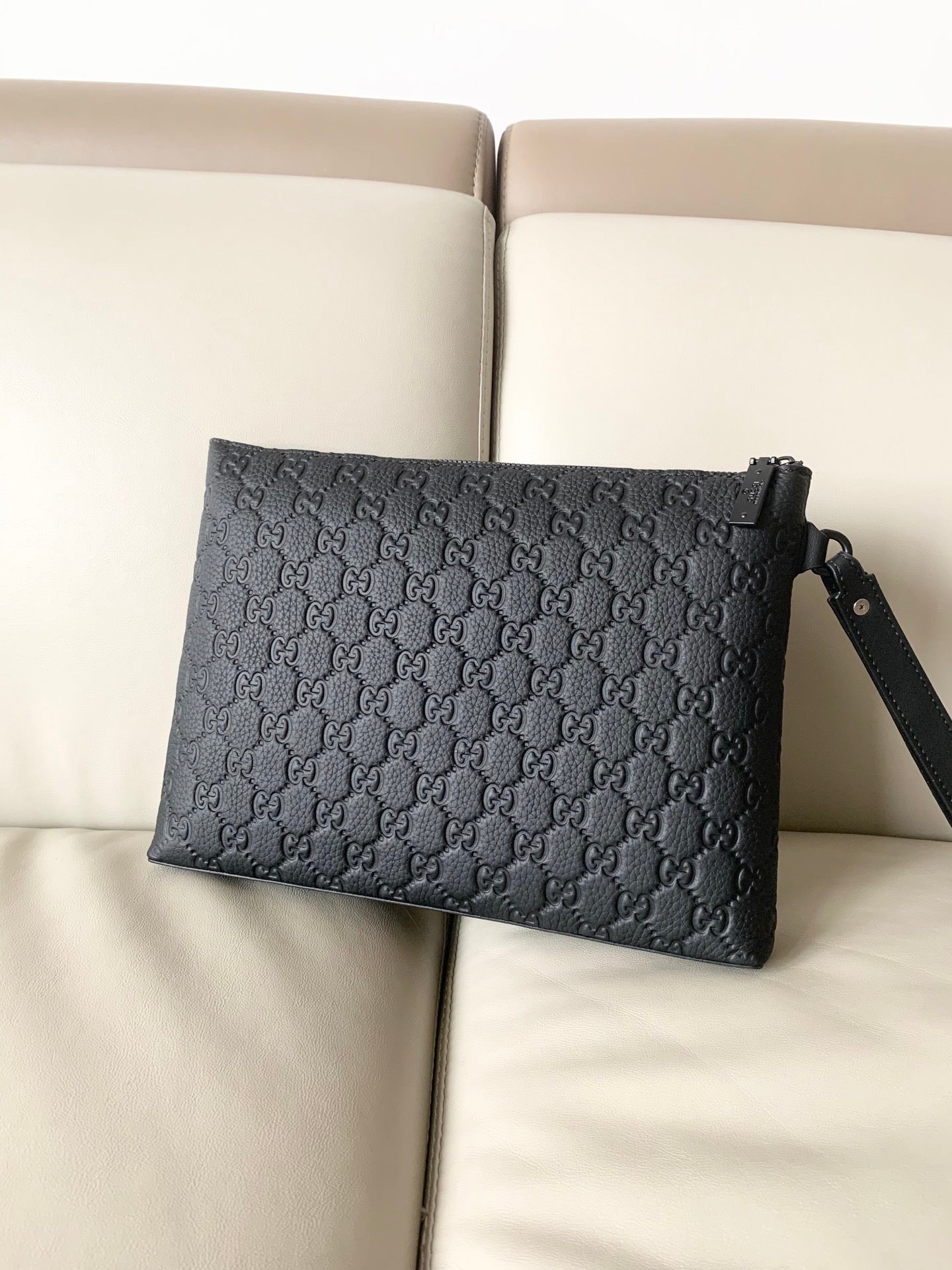 GUI Leather embossing clutch bag 1825042909