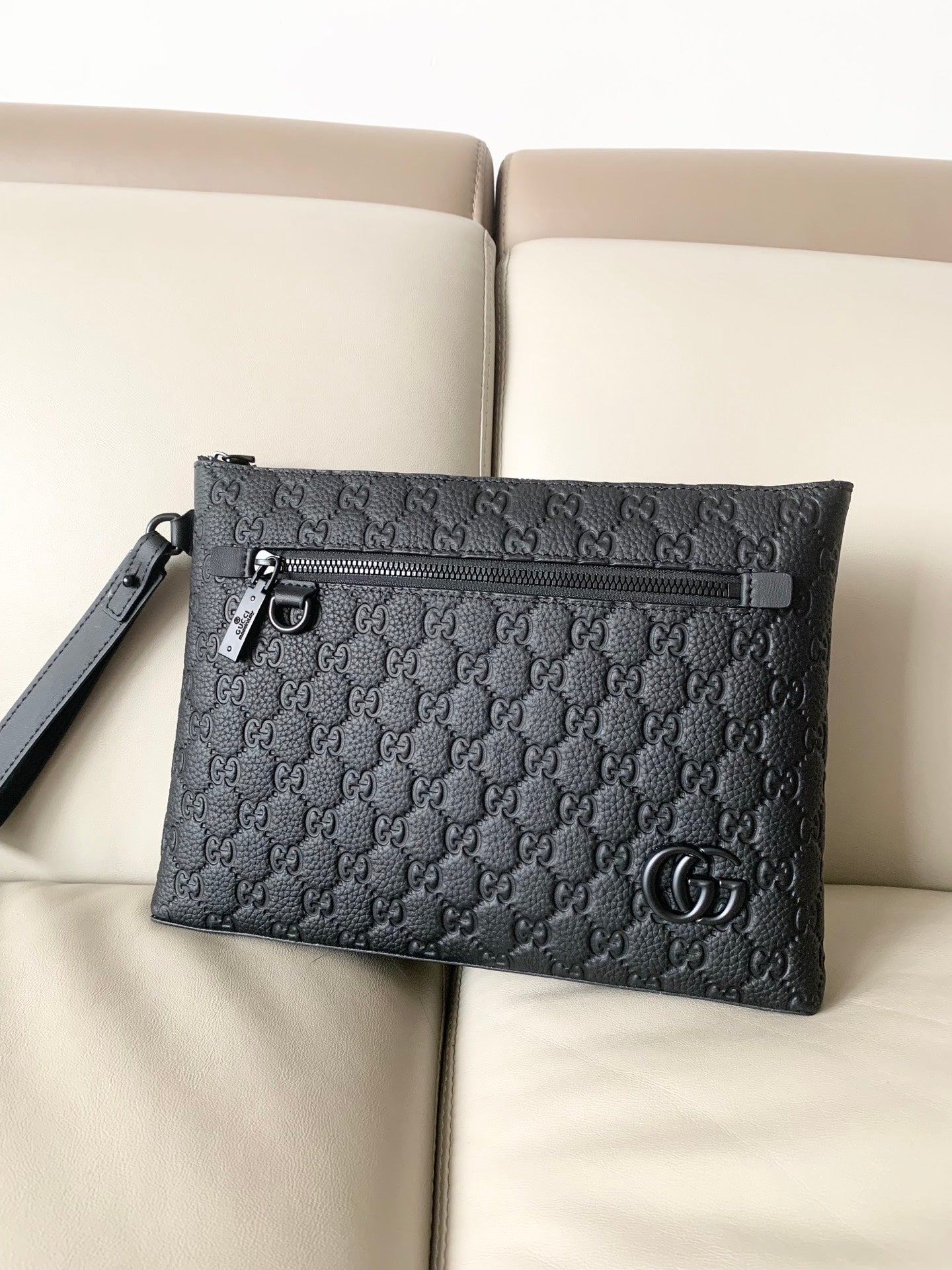 GUI Leather embossing clutch bag 1825042909