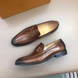 Brown leather shoes with small logo letters