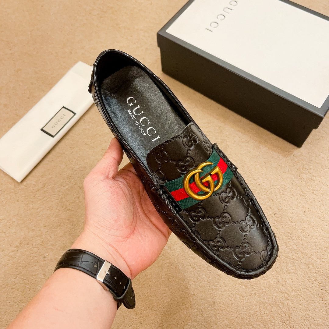 Letter-embossed leather loafers 1824040713